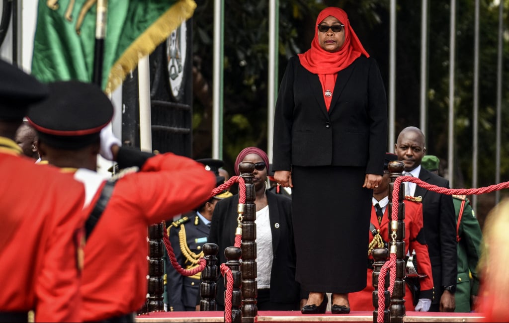 New Tanzanian President Samia Suluhu Hassan inspects a military parade following her swearing-in.