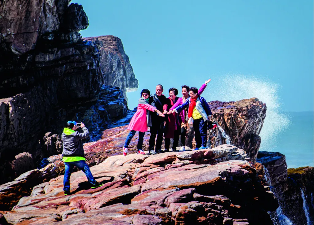 Chinese tourists at the Cape of Good Hope.