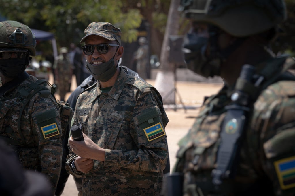 Rwandan President Paul Kagame smiles as he visits Rwandan troops in northeastern Mozambique.