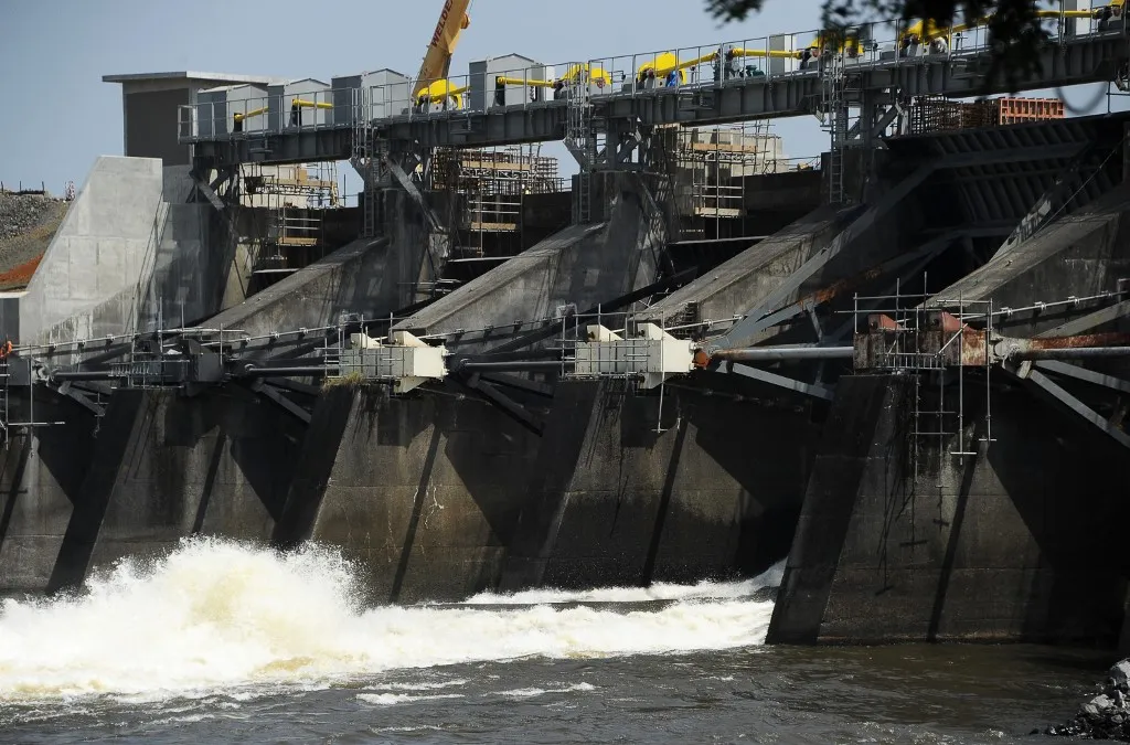 Waters surges through the sluices of the Mount Coffee Hydropower Project in Liberia.