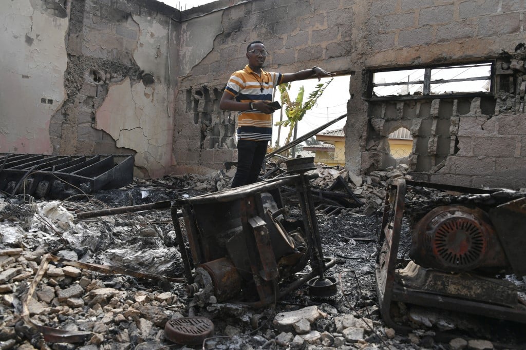 Election official in burned out building.