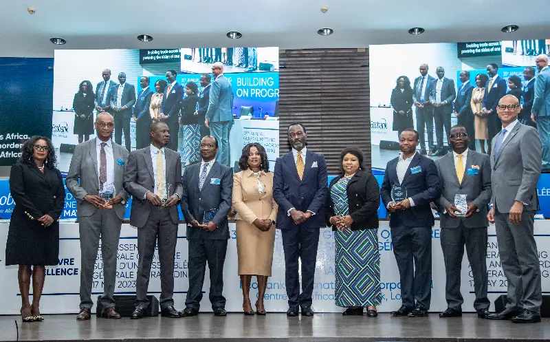 The winners of the Ecobank Foundation's Sustainable Development Trophy line up on stage.